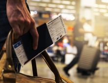 Passenger holding a passport