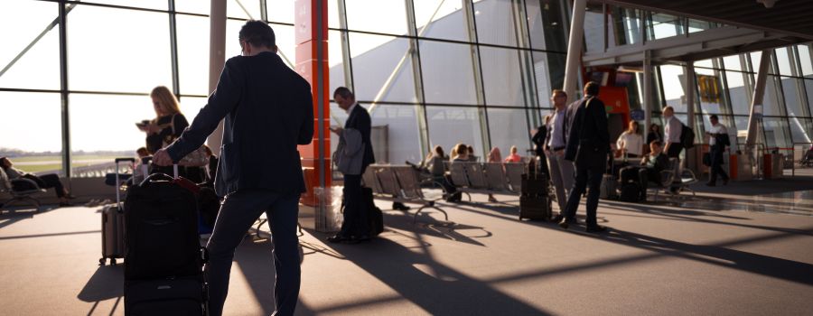 People waiting in airport terminal