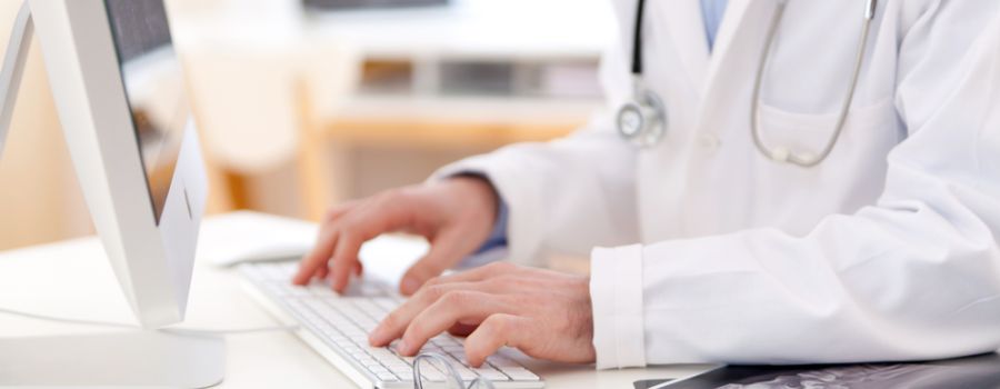 Doctor checking health record of patient online