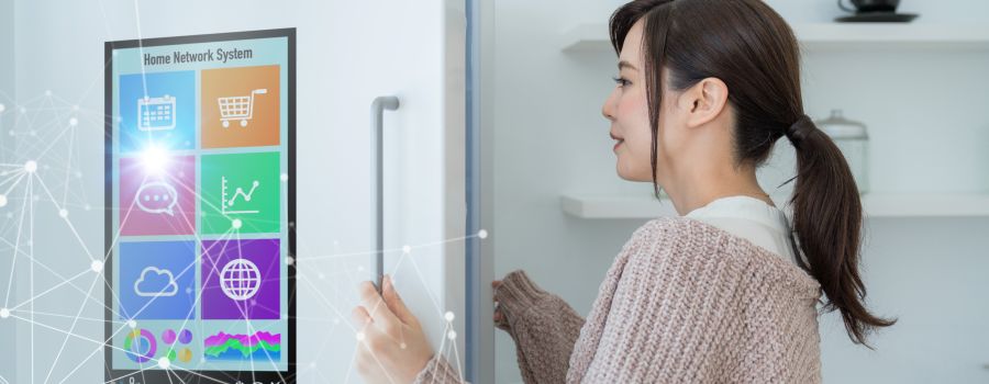 woman opening a smart fridge