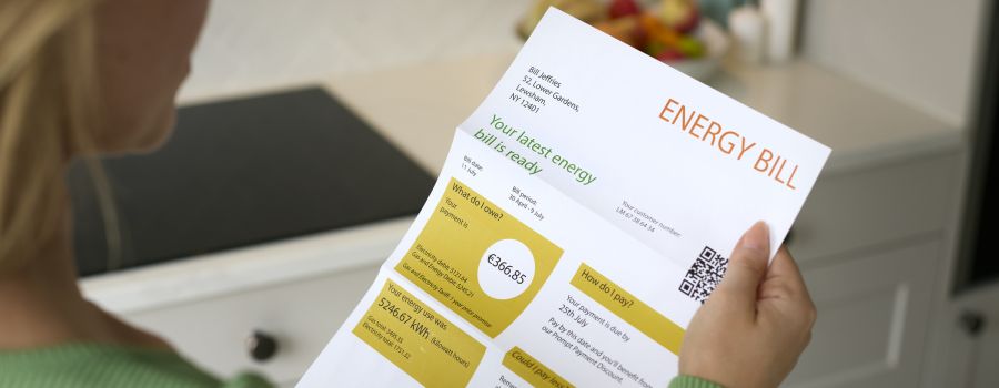 Woman reading her energy bill